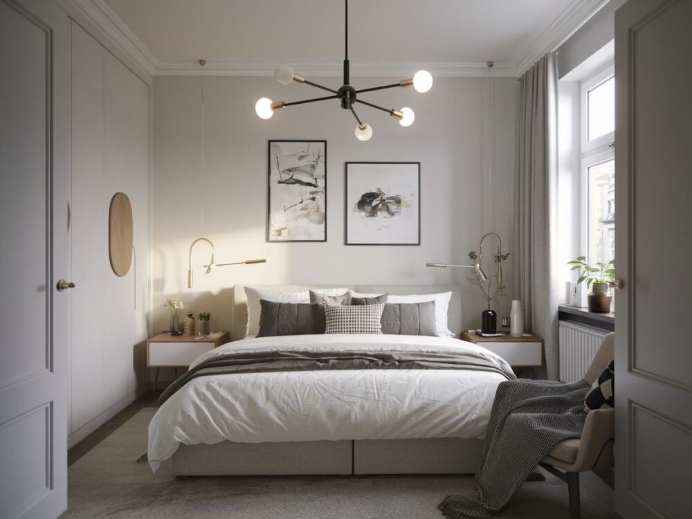 mała sypialnia z żyrandolem